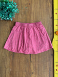 Short Saia Track Field Rosa TAM 10 Anos