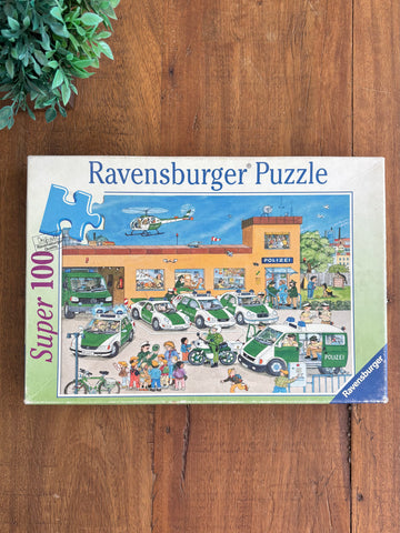 Quebra-cabeça Policia Ravensburger 100 peças TAM 49 x 36 cm