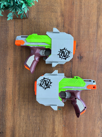 2 Lançadores Nerf Side Strike Zombie com 4 Dardos (cada) TAM 15 X 22 cm
