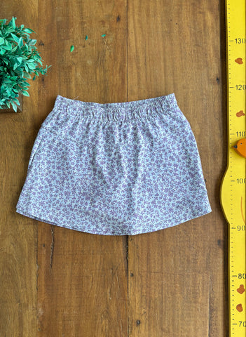Short Saia Track Field Floral Lilas TAM 10 Anos