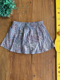 Short Saia Track Field Estampa Lilas TAM 12 Anos